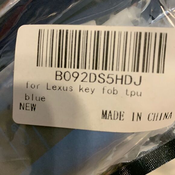 Lexus key fob with three key attached circle connectors for home/office keys. - Picture 6 of 6